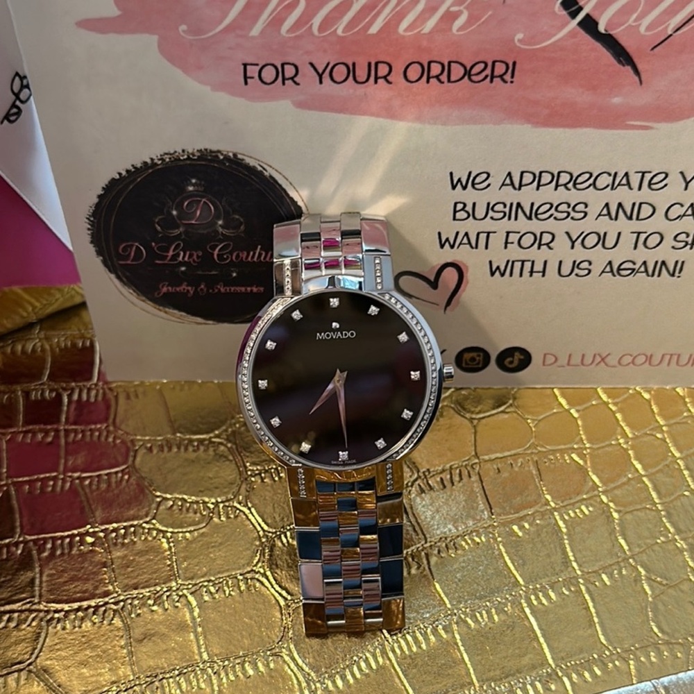 Gently used platinum Mens Movado diamond luxury watch (Helzberg Diamonds)💎